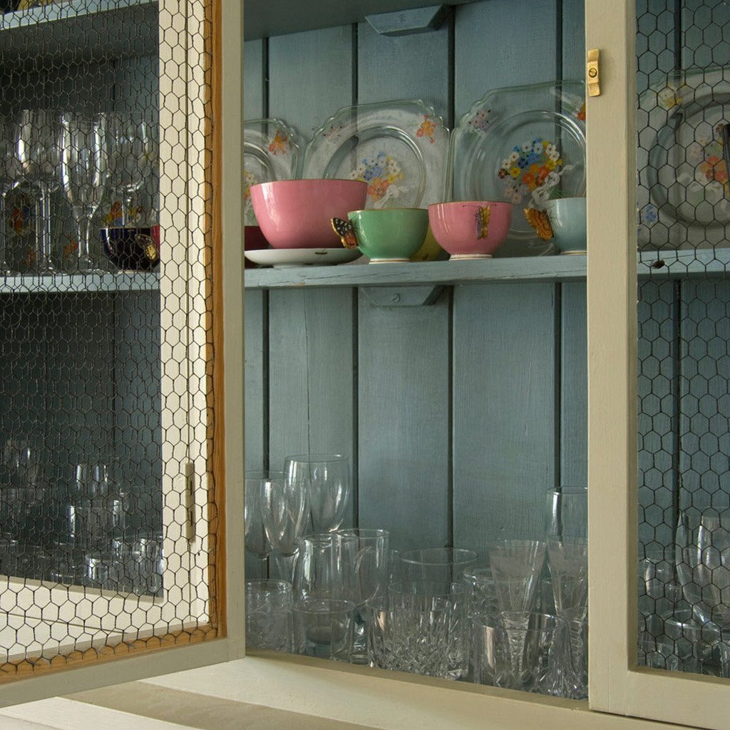 Inside kitchen cabinet painted in Farrow & Ball Lulworth Blue No.89