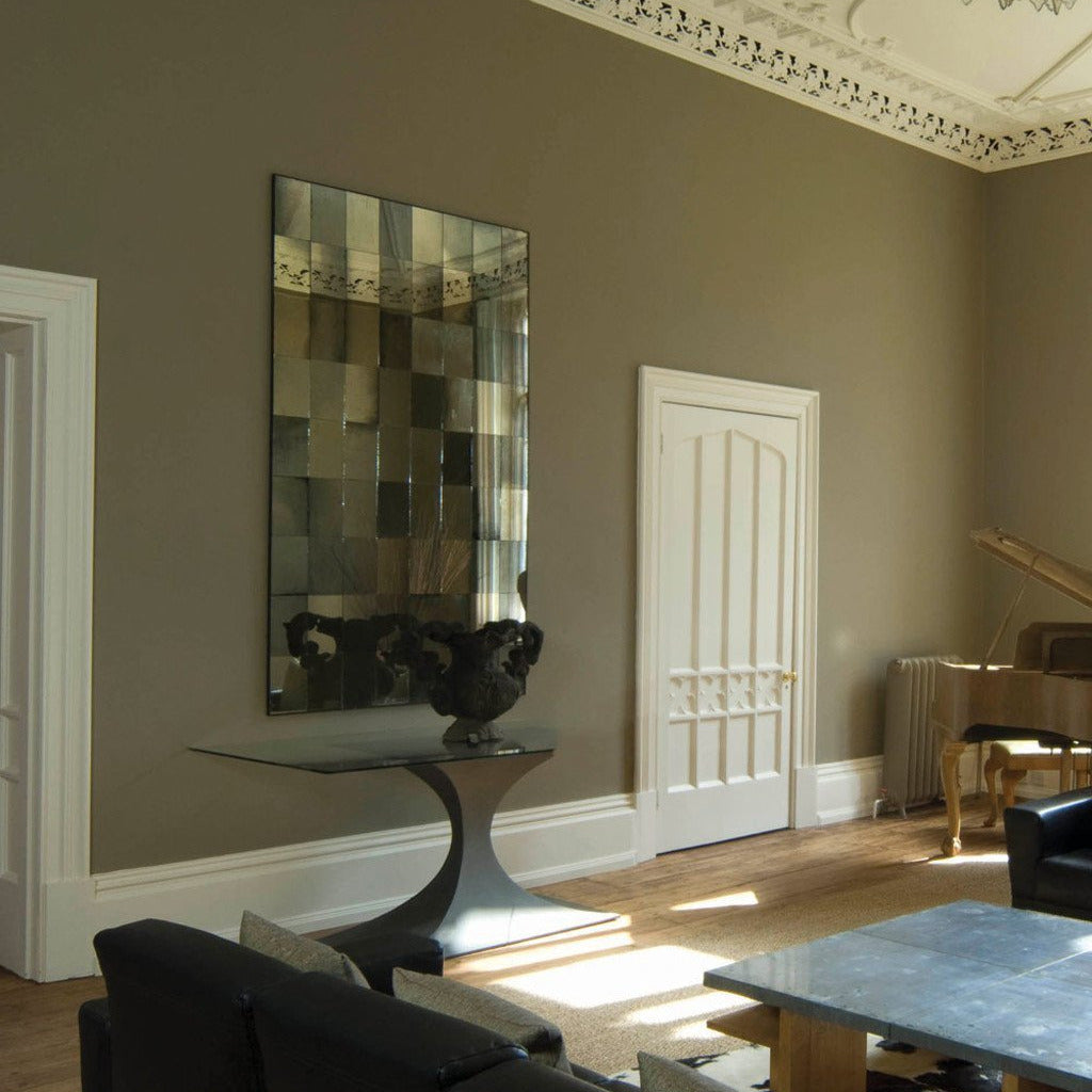 Stylish interior with walls painted in Farrow & Ball Mouse's Back No.40 Estate Emulsion.