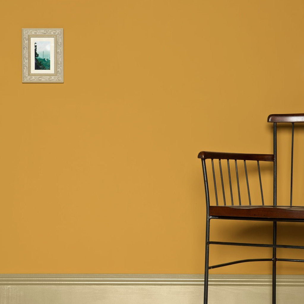 Wall painted in Farrow & Ball Sudbury Yellow No.51 Estate Emulsion