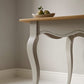 Farrow & Ball Cornforth White No.228 painted room detail with console table painted in the same colour.