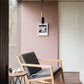 Modern interior showing a room with Farrow & Ball Sulking Room Pink No.295 painted on one wall